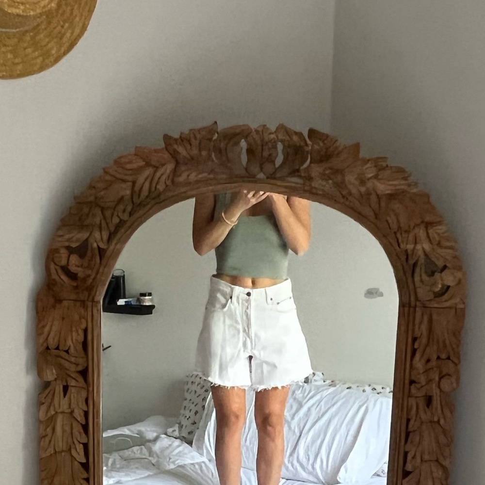 White slightly distressed Abercrombie & Fitch jean shorts.
